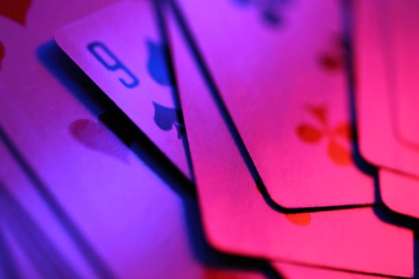 Live dealer dealing cards in No Commission Baccarat round